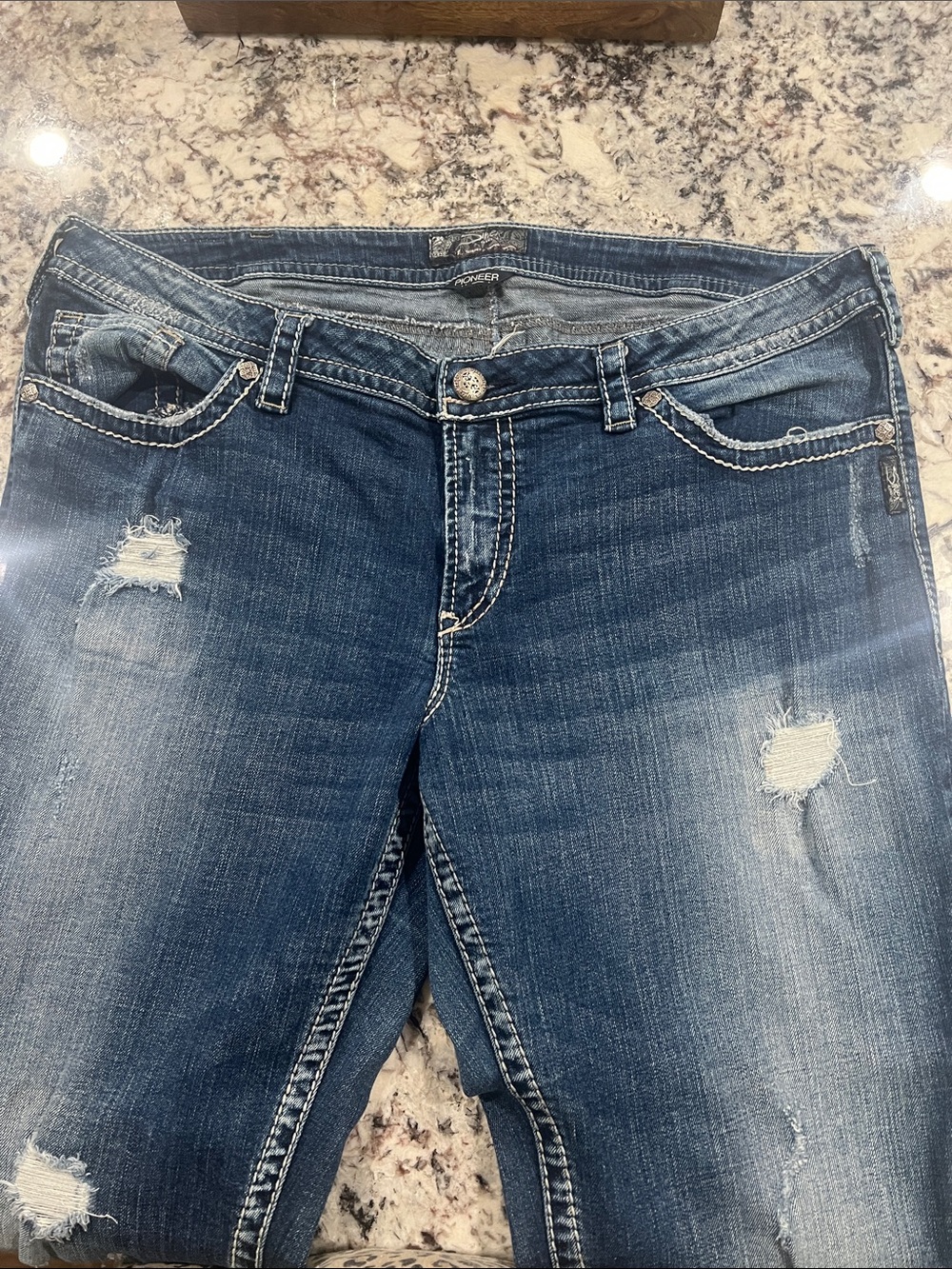 Silver Jeans Distressed Dark Blue Flare Jeans